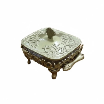Coastal themed casserole dish, featuring a glass bottom and metal lid and stand