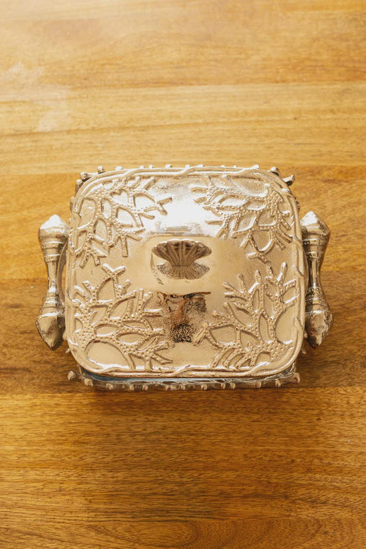 Coastal themed casserole dish, featuring a glass bottom and metal lid and stand