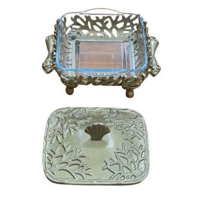 Coastal themed casserole dish, featuring a glass bottom and metal lid and stand